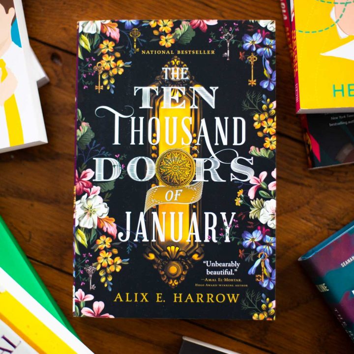 A copy of The Ten Thousand Doors of January by Alix E. Harrow sits on a table.