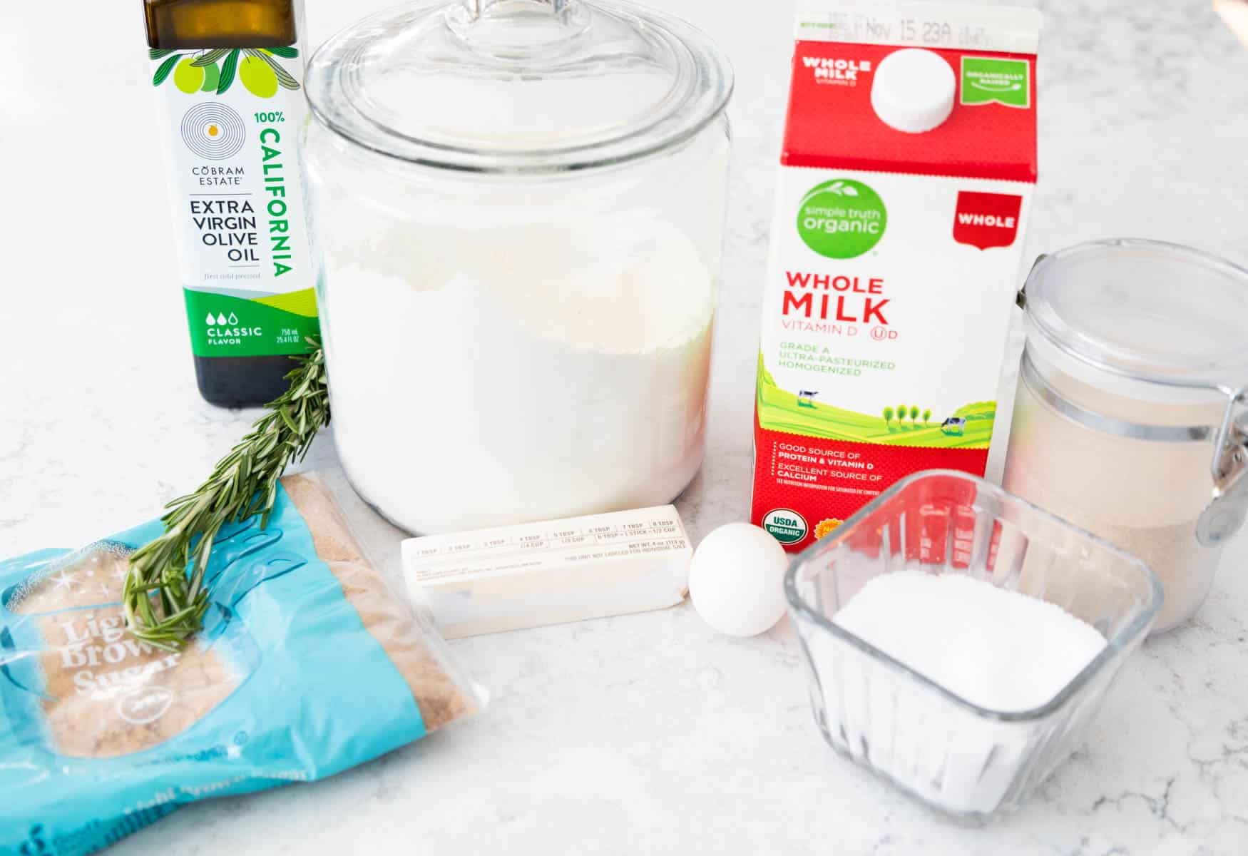 The ingredients to make the homemade dinner rolls are on the counter.