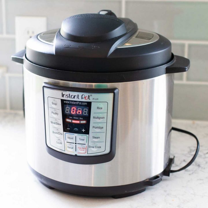 An Instant Pot sits on a kitchen counter to demonstrate an Instant Pot recipes category.
