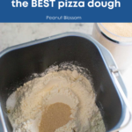 Bread Maker Tips: How to load the pan for the BEST pizza dough shows the bread pan with yeast and flour loaded correctly.