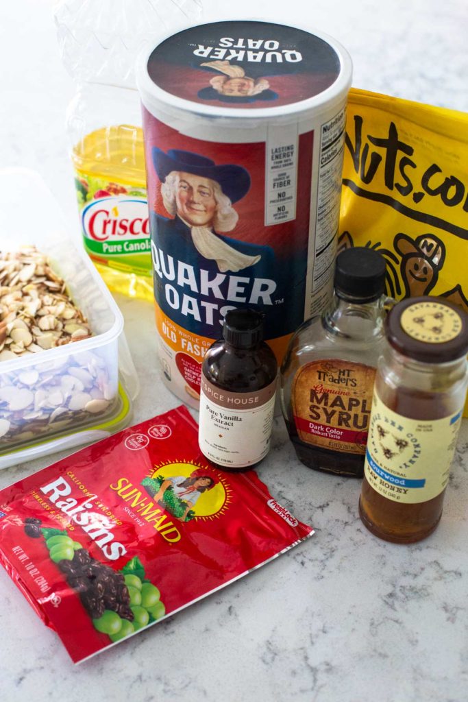 The ingredients for homemade granola sit on a kitchen counter.