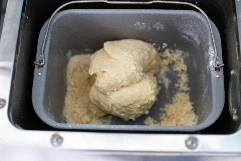 Dry pockets of flour can collect in the corners of the bread pan.