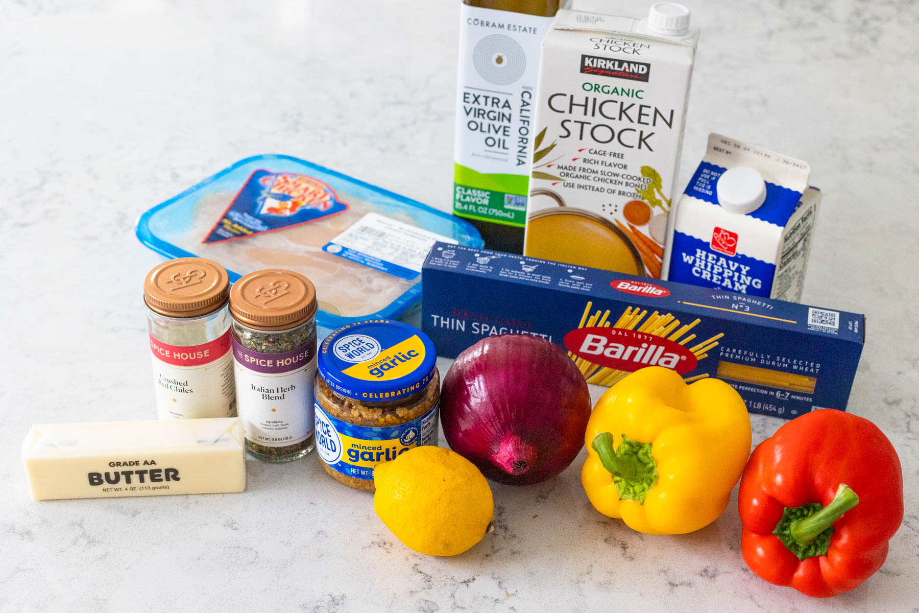 The ingredients to make chicken scampi are on the counter.
