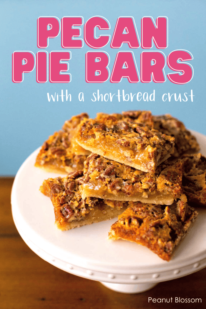 A cake plate with a stack of pecan bars on top. Caption reads: Pecan Pie Bars with a shortbread crust"