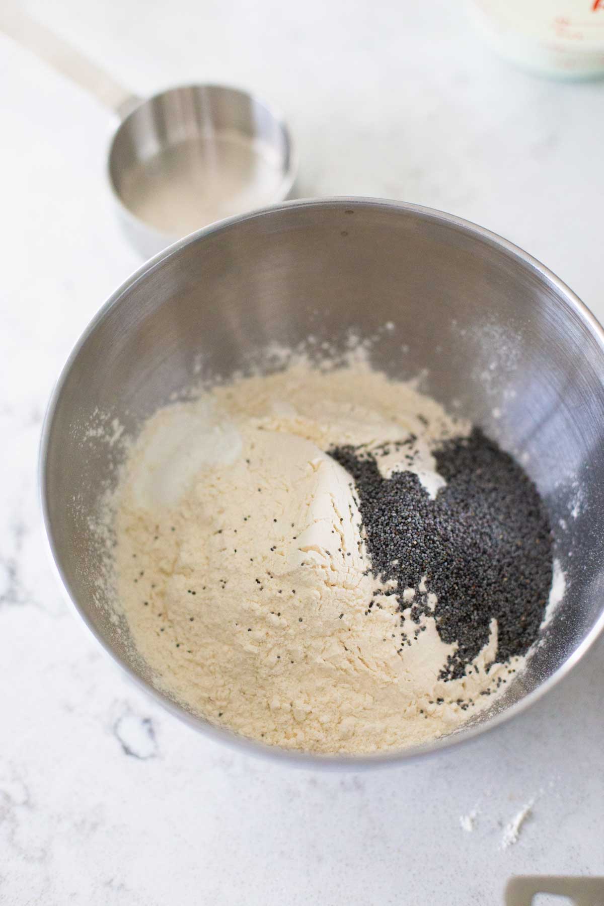 Mix the poppy seeds with the dry ingredients first.