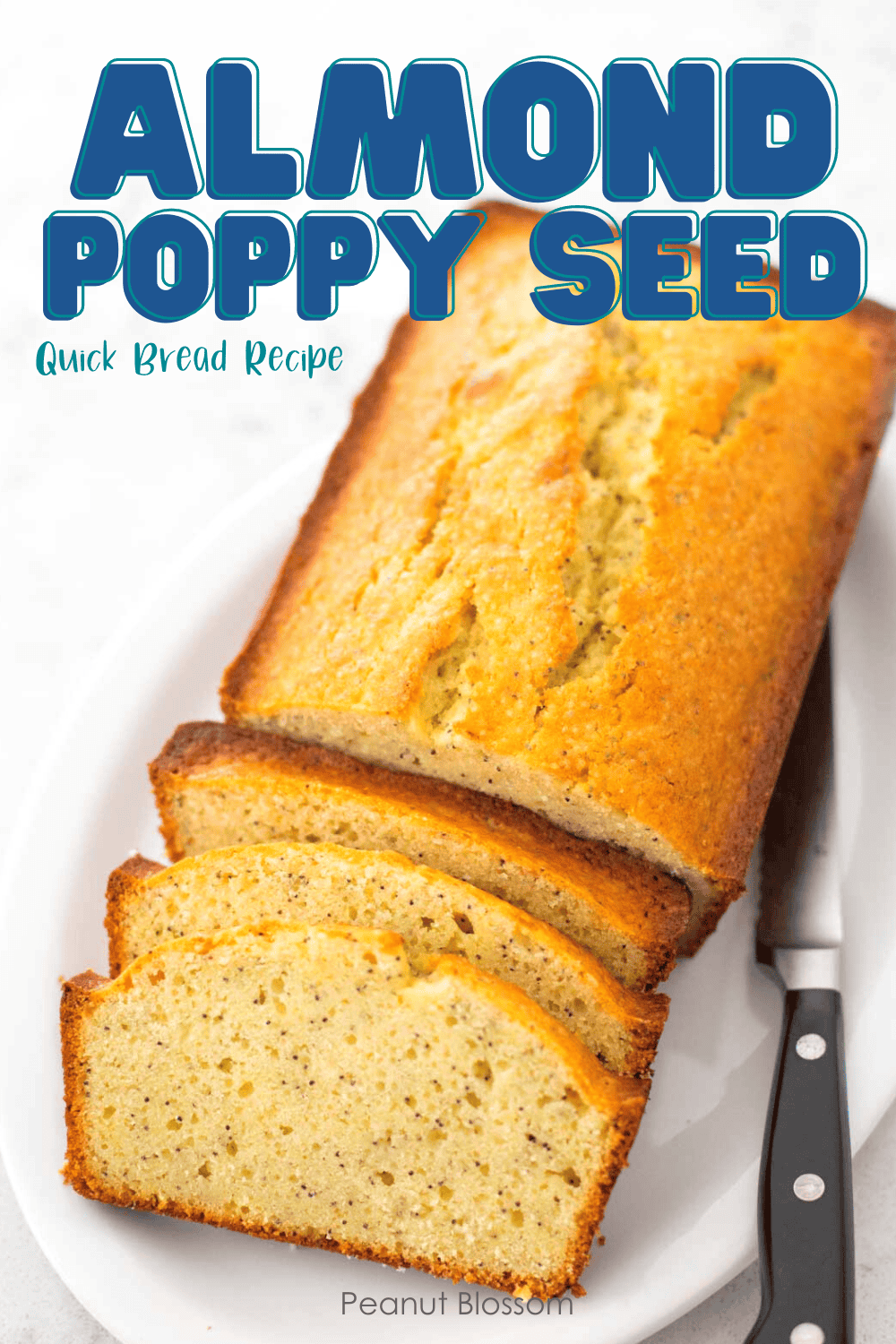 The baked almond poppy seed bread is ready to be served for breakfast and has a knife on the side of the platter.