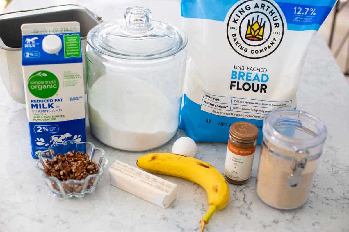 The ingredients for the banana bread are on the counter.