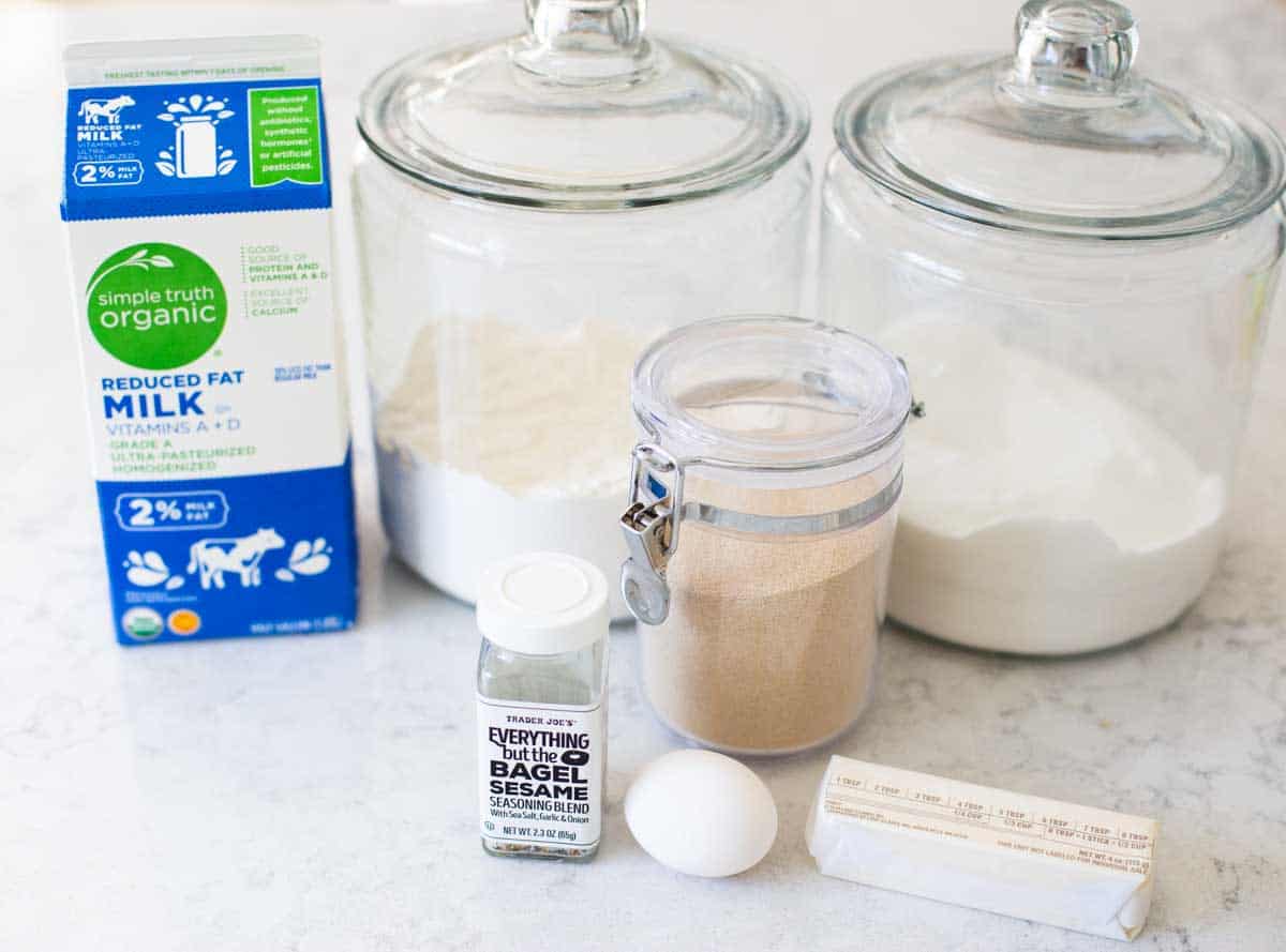 Ingredients for Everything Bagel bread sit on a kitchen counter.