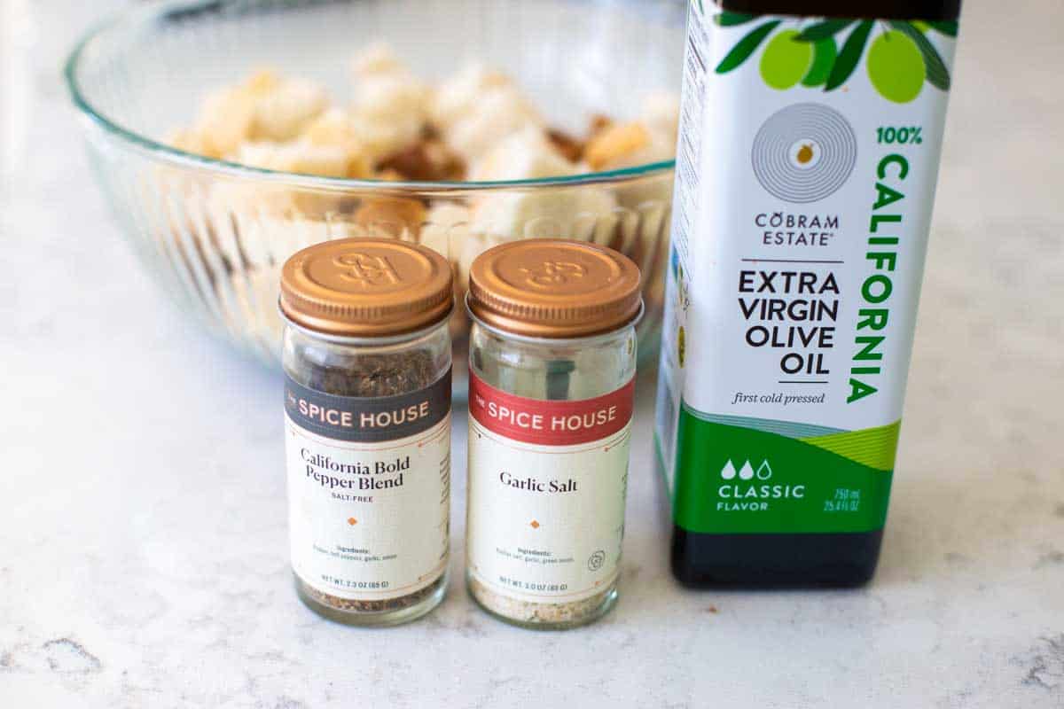 The ingredients for homemade croutons made from leftover bread sit on a counter.