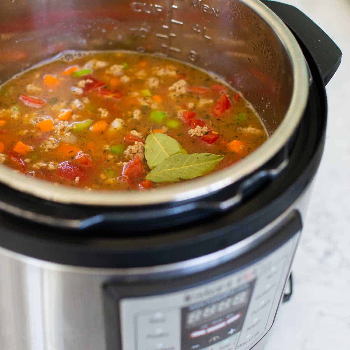 The finished ground turkey soup is ready to be served from the Instant Pot.