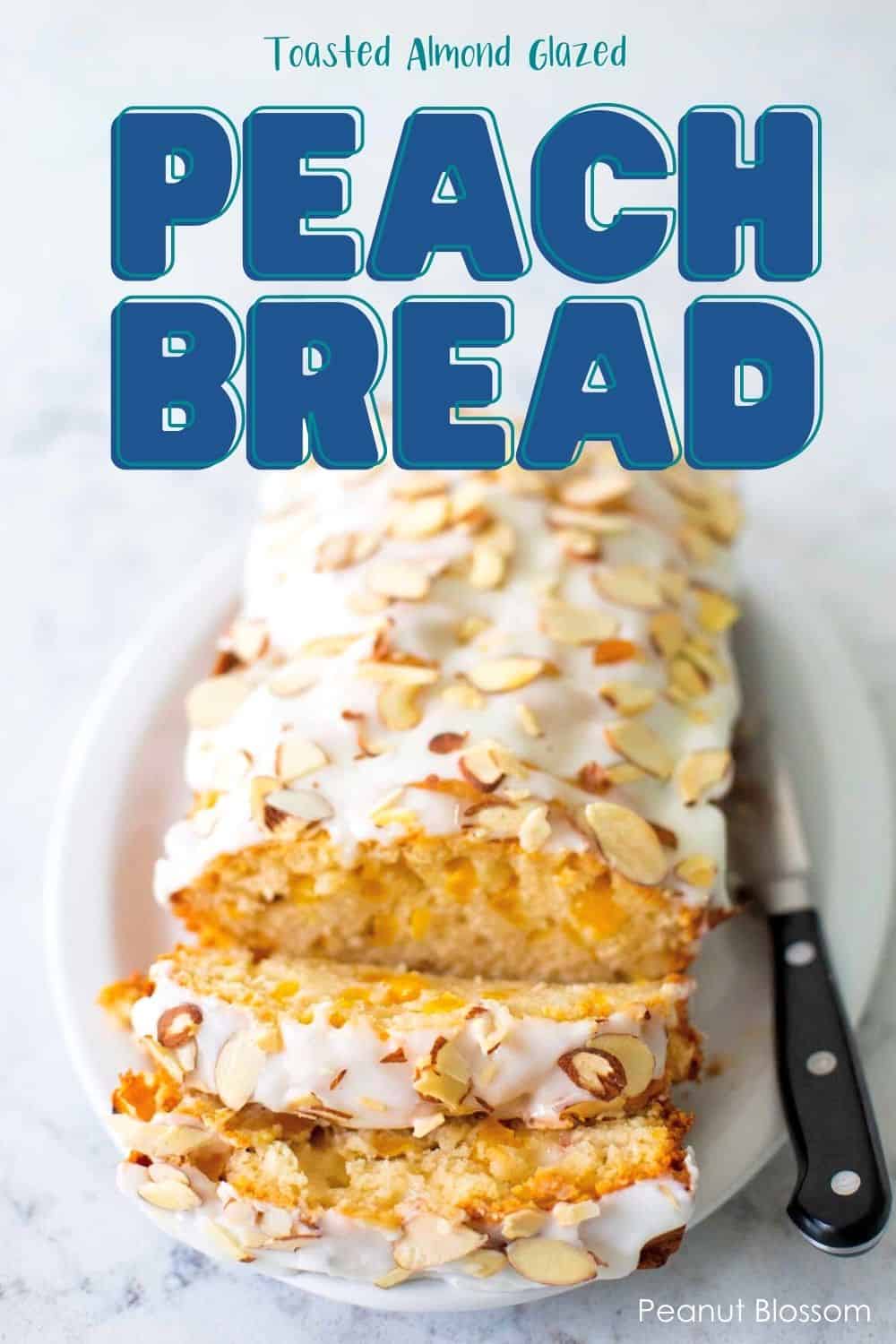 The sliced loaf of peach bread shows the drizzled glaze and toasted almonds on top. 