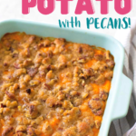 A baking dish filled with sweet potato casserole has a crispy pecan topping.