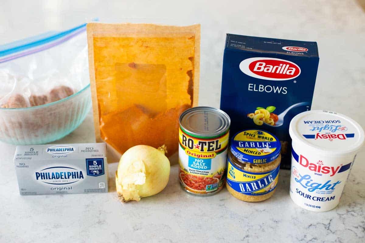 The ingredients for the creamy taco pasta skillet recipe are on the counter.