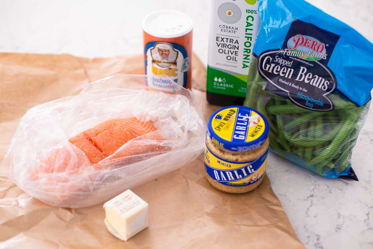 The salmon, green beans, and other ingredients to make the Air Fryer recipe are on the counter.