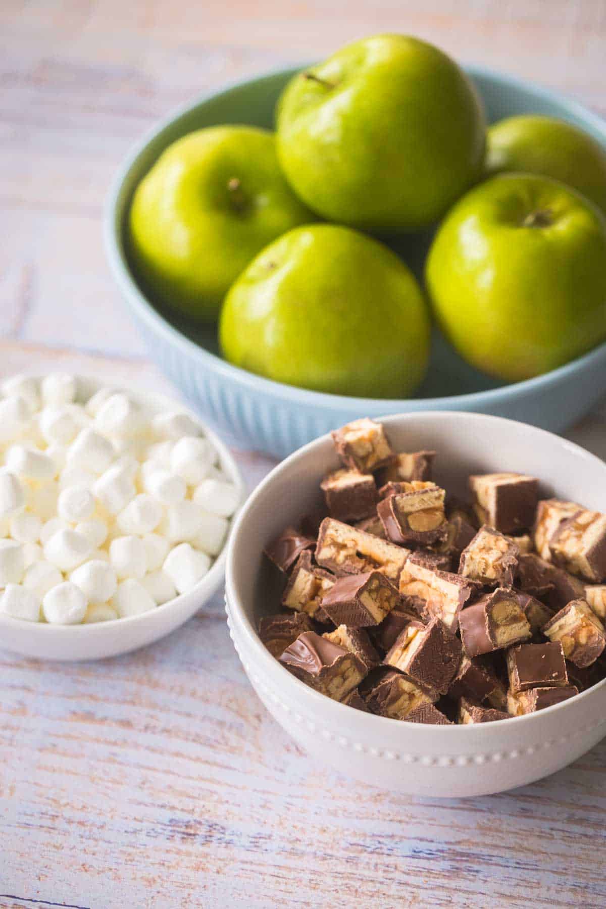 The ingredients for the snickers salad are on the counter.