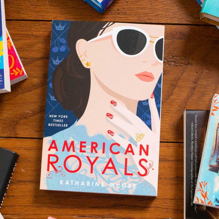 A copy of American Royals by Katharine McGee sits on a table.