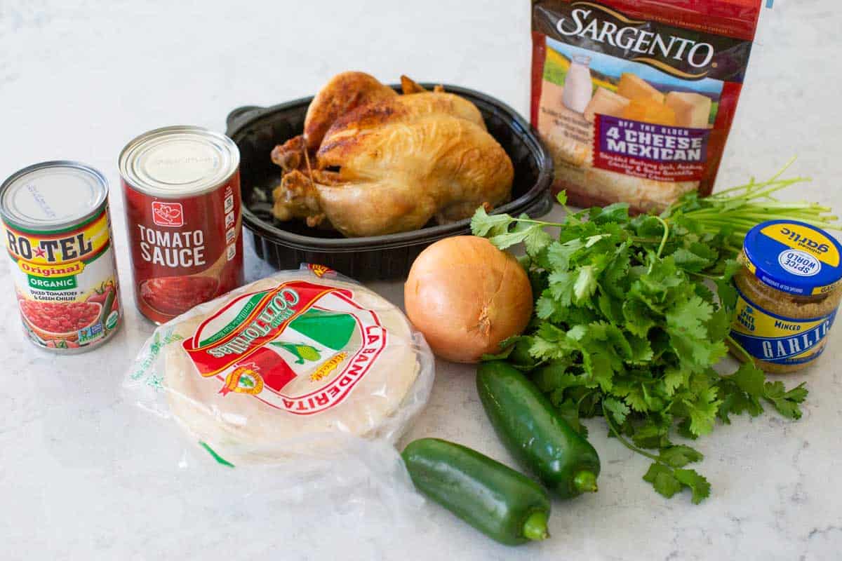 The ingredients to make the chicken enchiladas are on the counter.