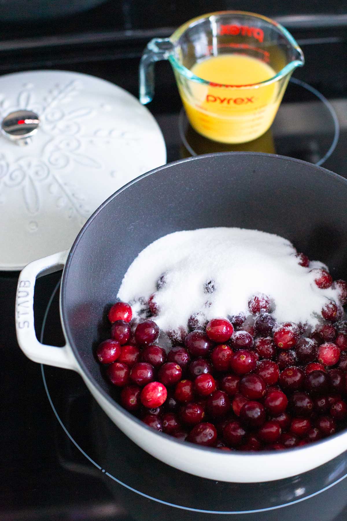 The ingredients for the homemade cranberry sauce are prepped and ready for cooking.