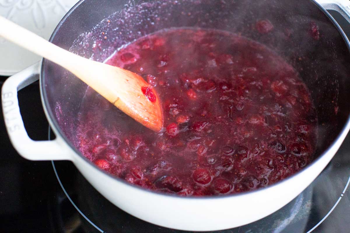 The cranberries have been cooked until they burst and become a sauce.