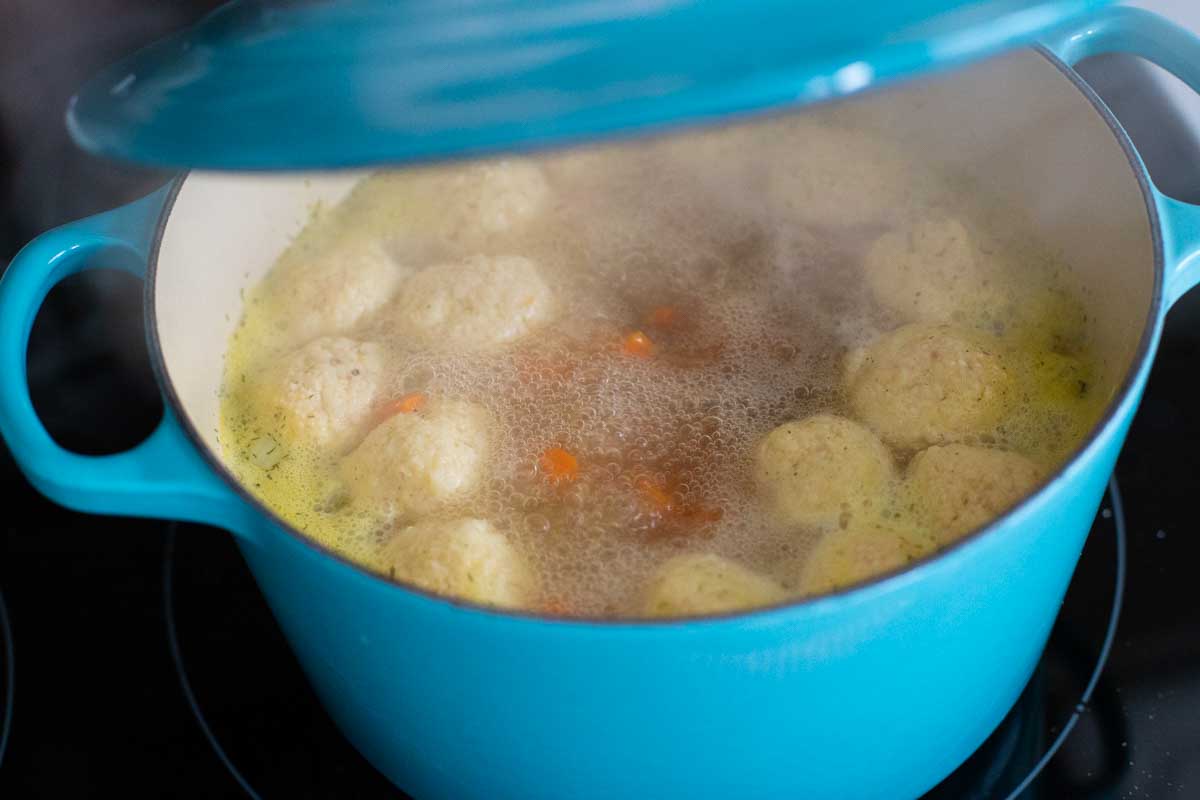 The matzoh balls cook with the lid over the soup pot.