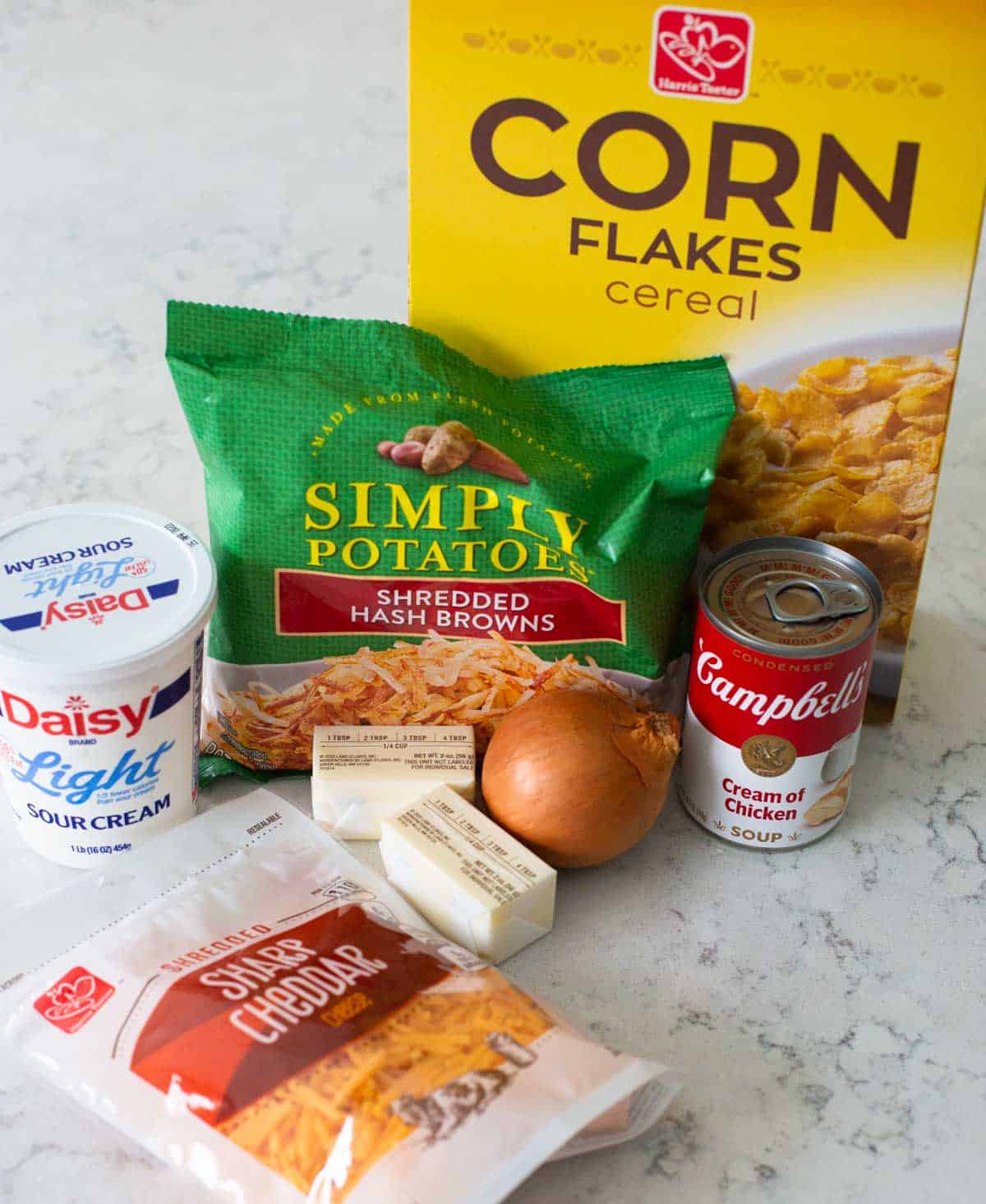 The ingredients to make funeral potatoes are on the counter.