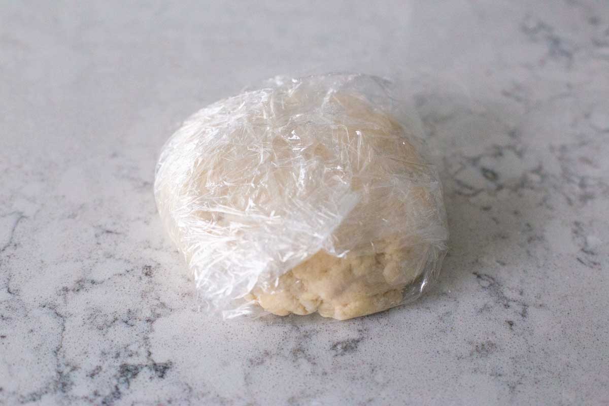 The pie dough is wrapped and ready to be chilled.