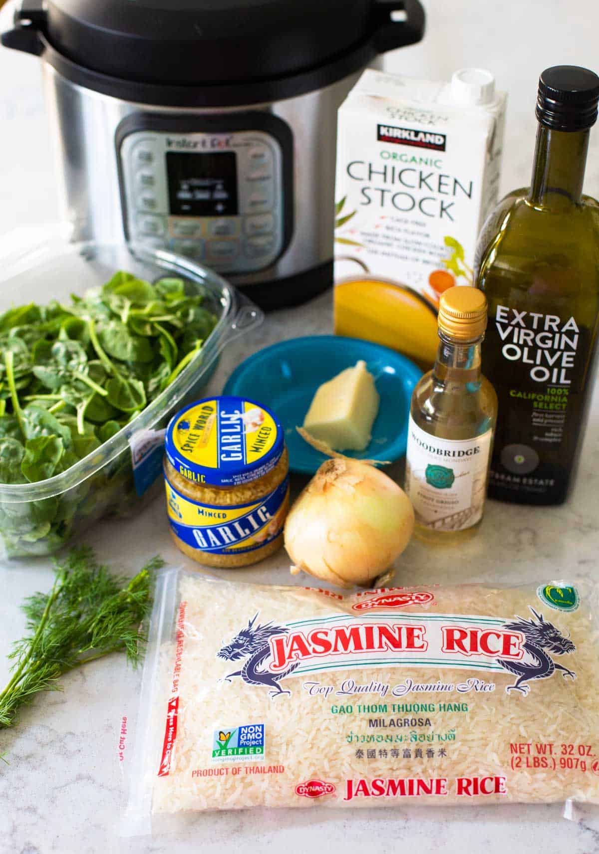 The ingredients to make Mediterranean shrimp and rice in the Instant Pot are on the counter.