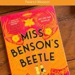 A copy of Miss Benson's Beetle by Rachel Joyce sits on a table.