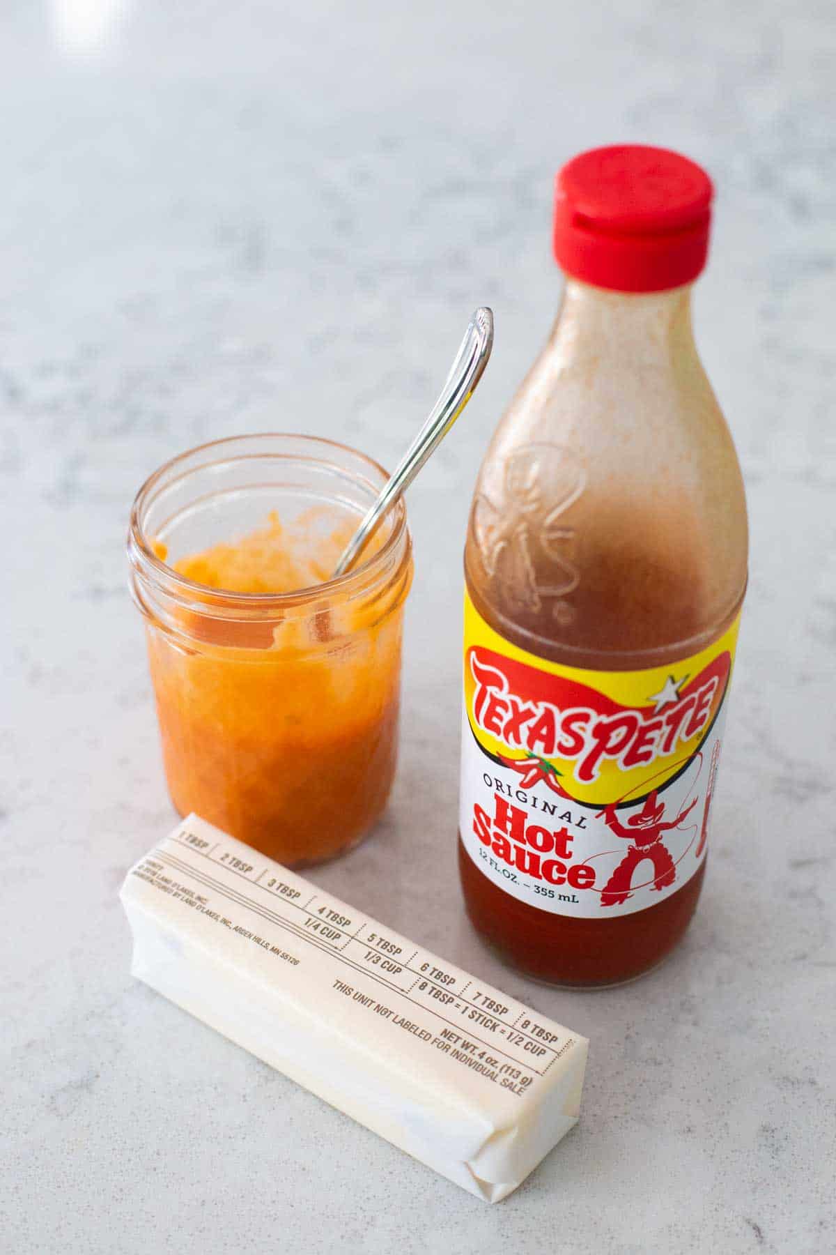 The ingredients to make homemade buffalo sauce.