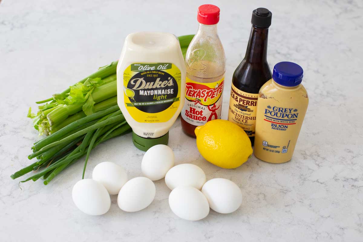 The ingredients to make egg salad are on the counter.