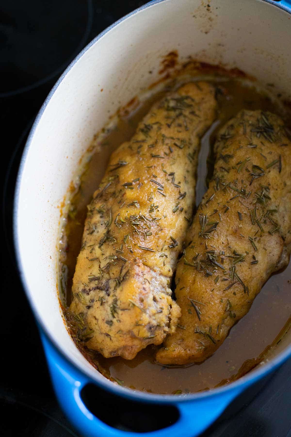 The applesauce pork has been baked in the oven.