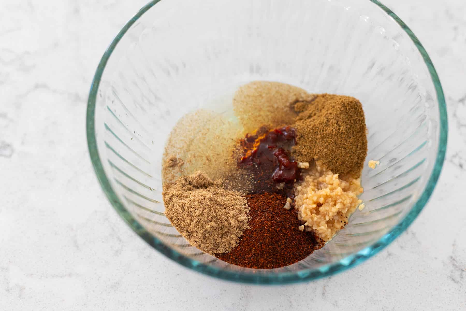 The seasonings for the tacos are in a mixing bowl.