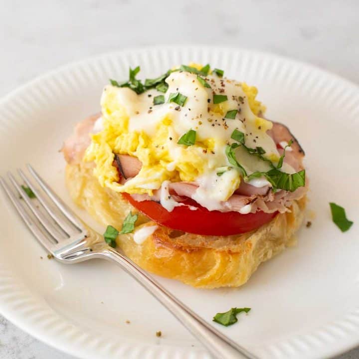 An eggs benedict on a croissant.