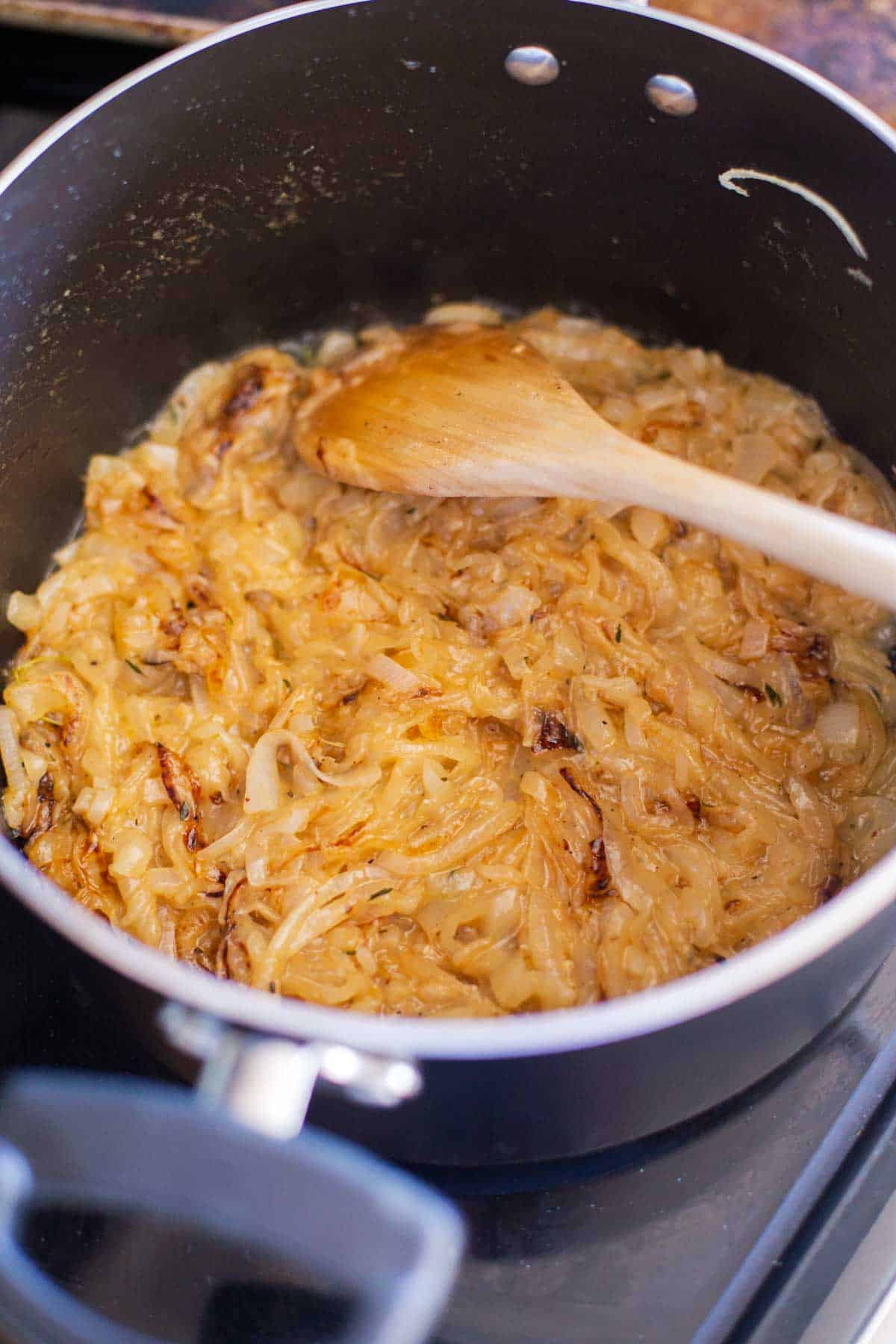 The onions have finished cooking and are a deep golden brown.