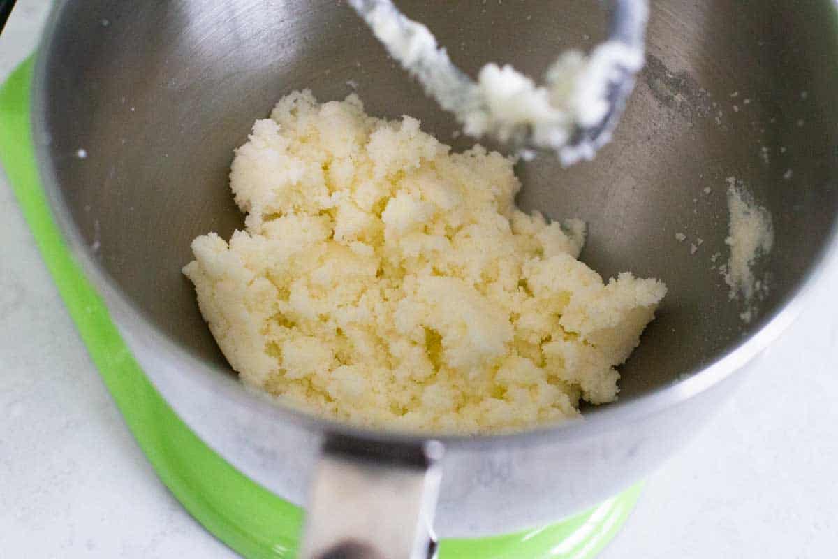 The lemon curd base starts with butter in a stand mixer.