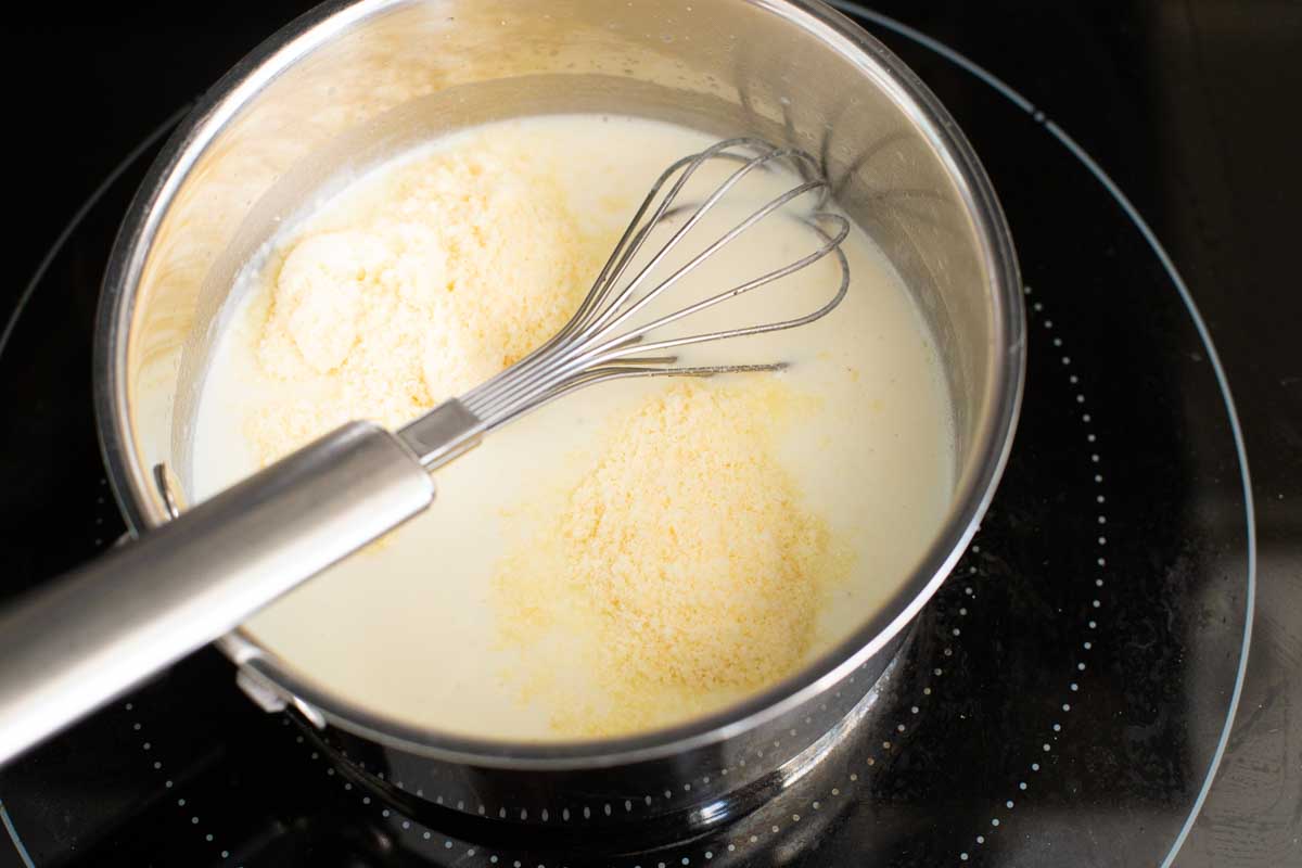 The grated parmesan has been added to the cream sauce.