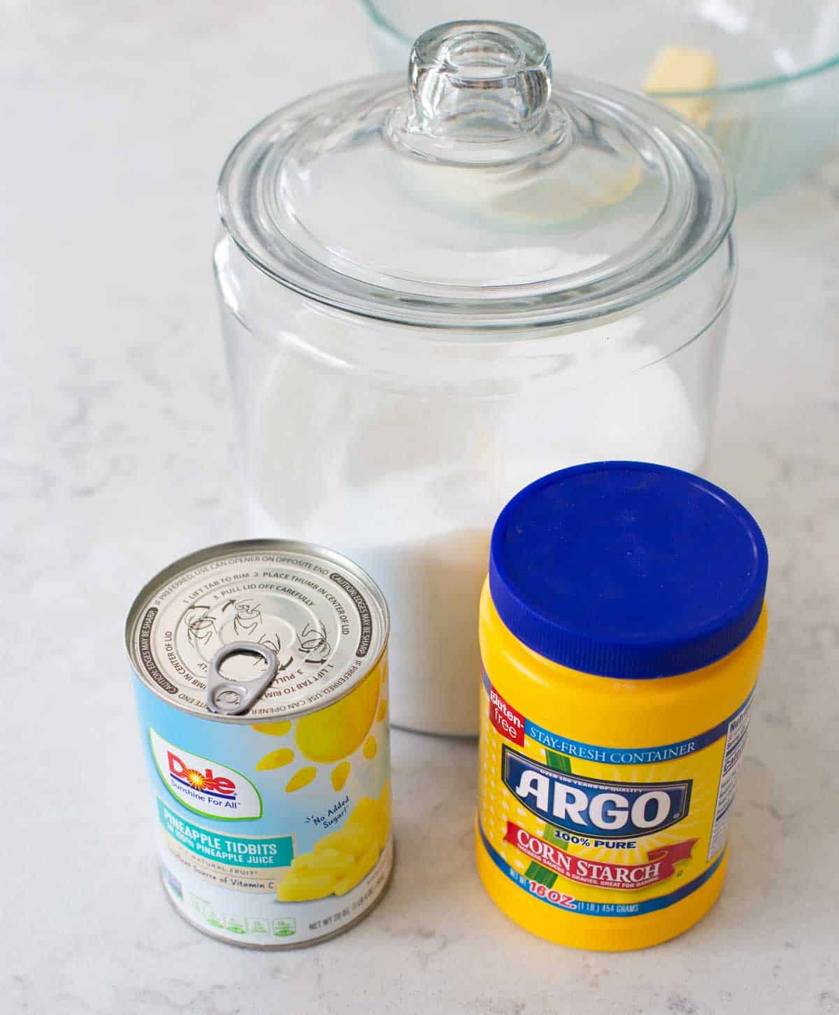 The ingredients to make pineapple filling for cakes.