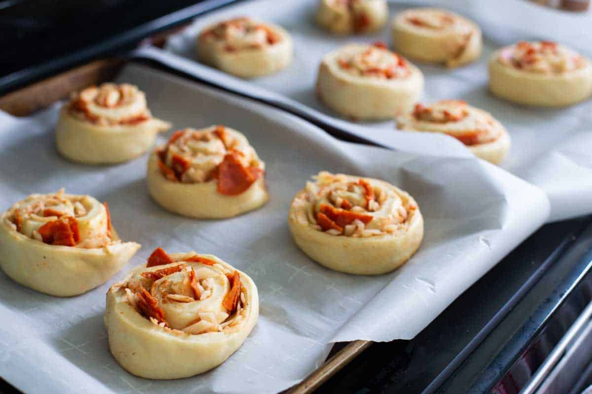 The dough has risen and the pizza buns are nice and puffy.