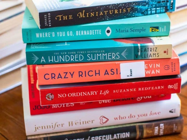 A pile of book club books.