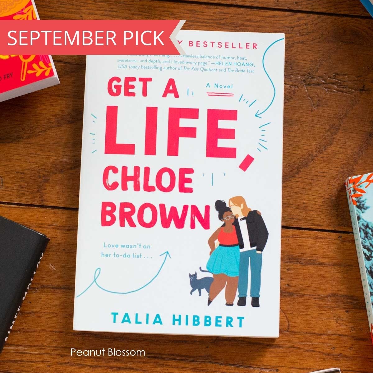 A copy of Get a Life, Chloe Brown by Talia Hibbert is on the table.