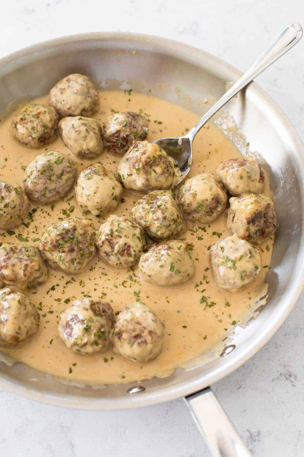 The Swedish meatballs are ready to be spooned over noodles.