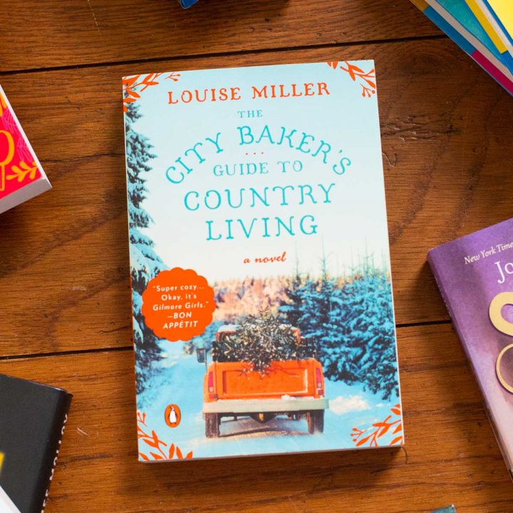 A copy of The City Baker's Guide to Country Living on a table.