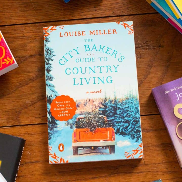 A copy of The City Baker's Guide to Country Living on a table.