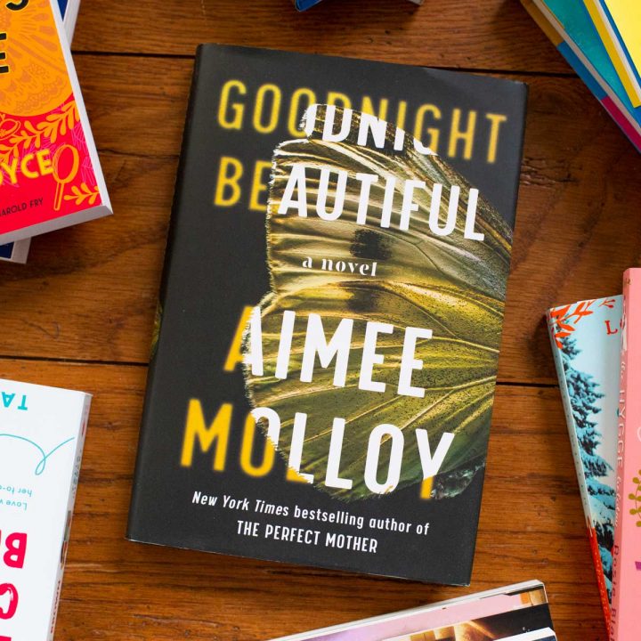 A copy of Goodnight Beautiful by Aimee Molloy sits on a table.