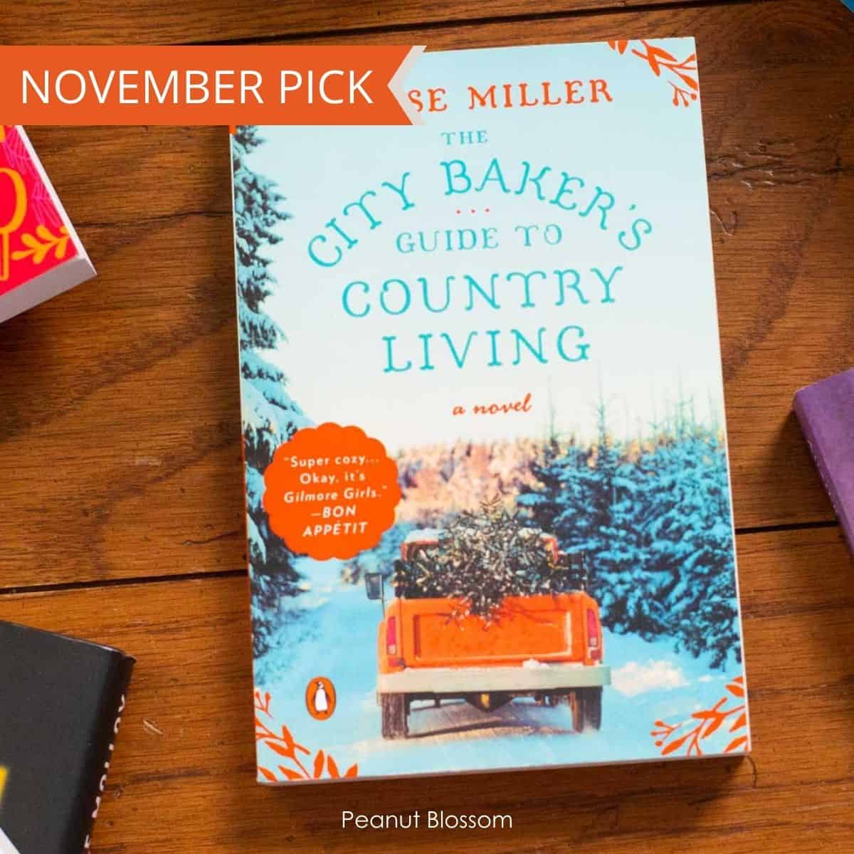 A copy of The City Baker's Guide to Country Living on a table.