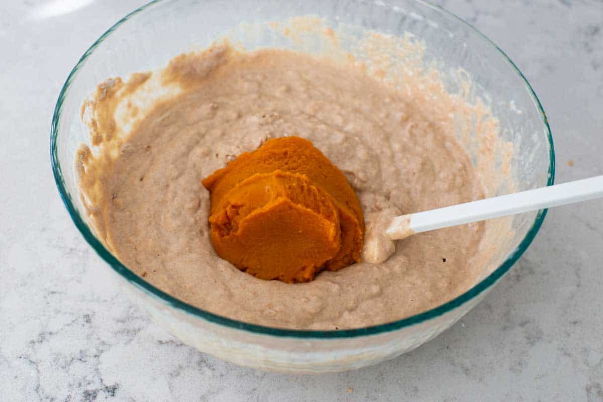 The canned pumpkin is added to the waffle batter.