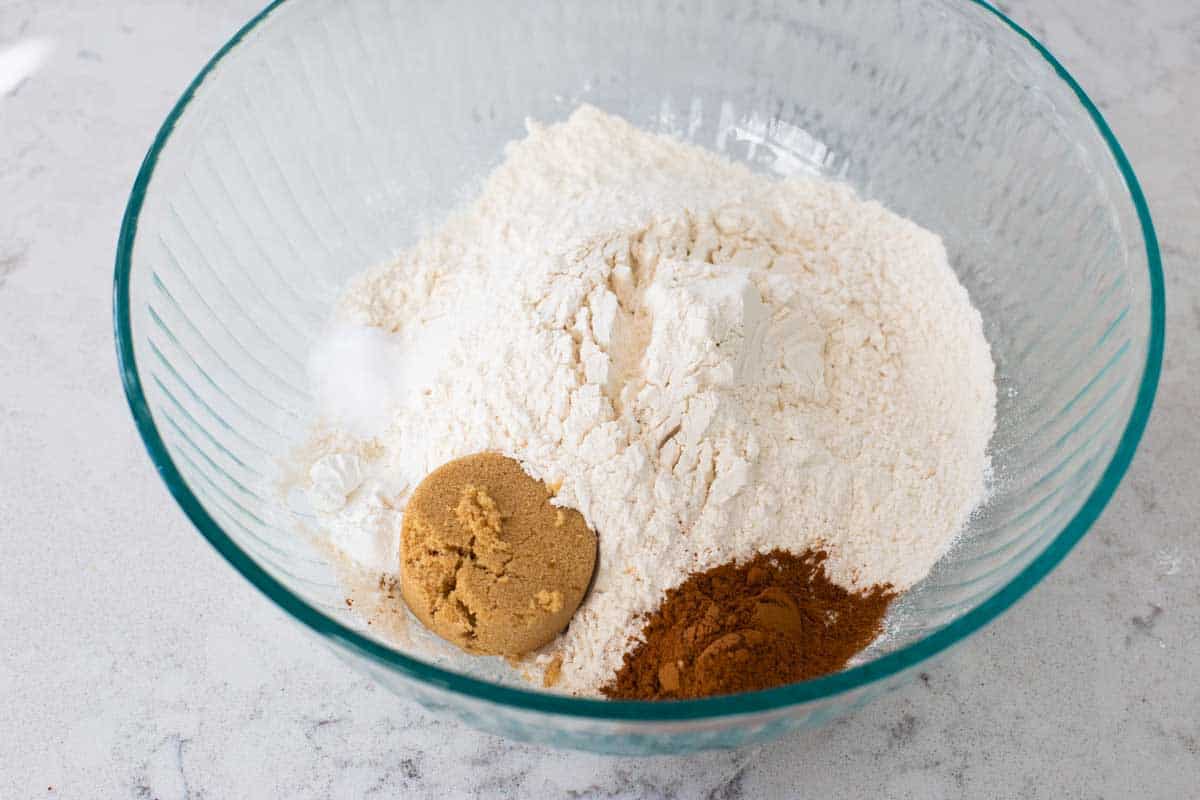 The flour, sugar, and seasonings are in the mixing bowl.