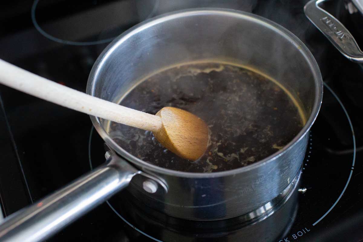 The ingredients have been added directly to the sauce pan and are being stirred over medium heat.