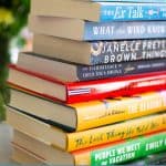 A stack of book club books.