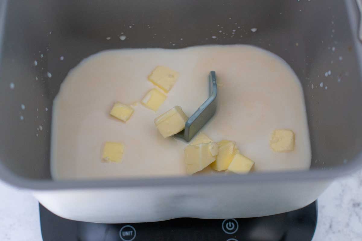 The milk and butter are in the bread pan.